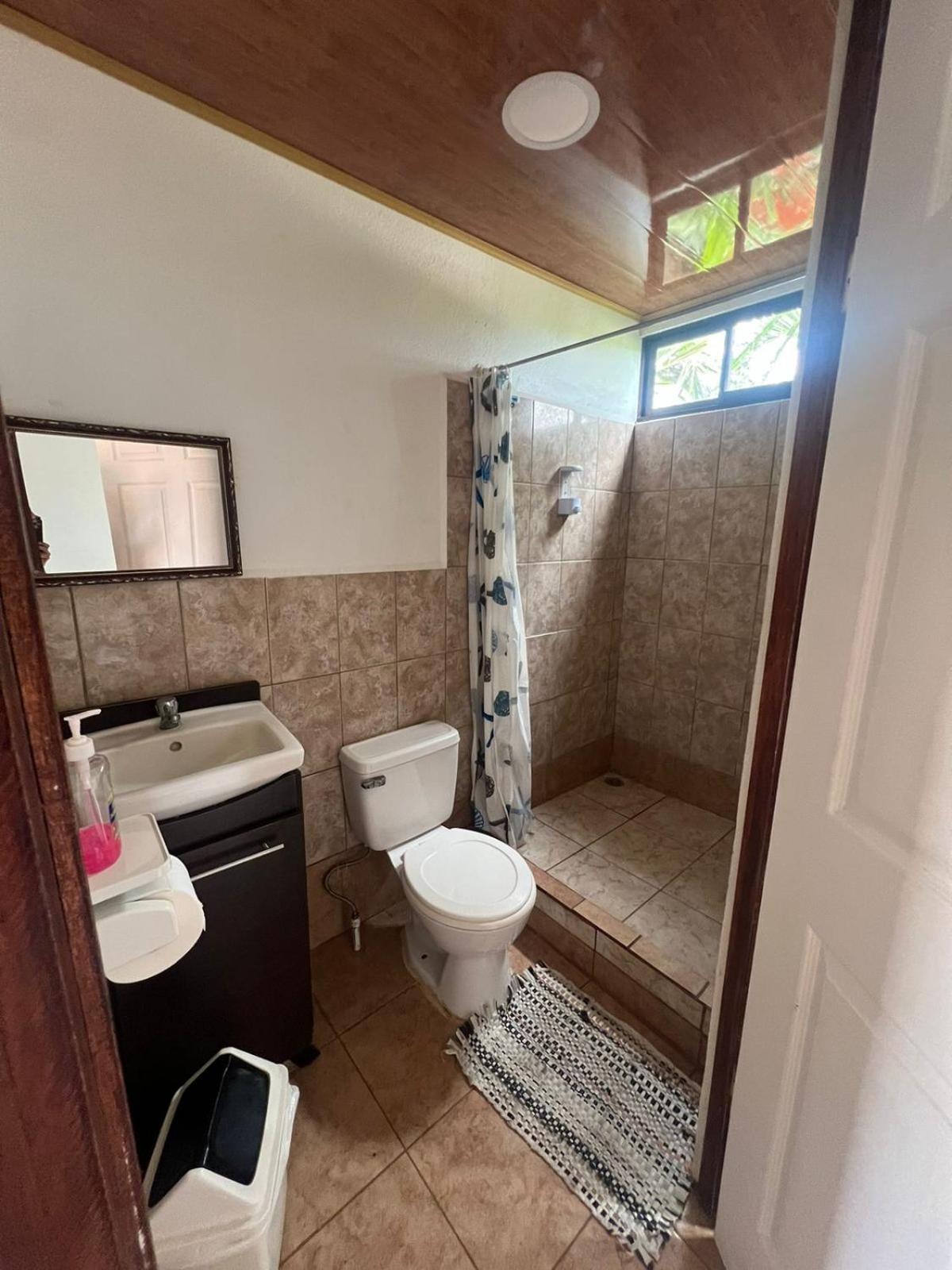 Cabinas Playa Bandera Bed & Breakfast Parrita Bagian luar foto